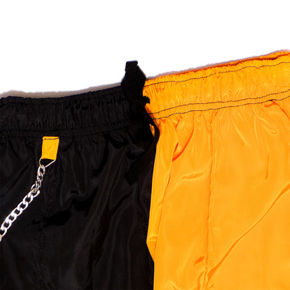 Jogger bicolor negro amarillo